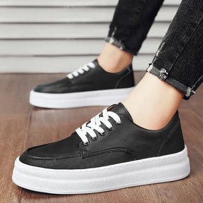 Tênis Masculino em Couro Forllini FL304 nas cores marrom e preto.